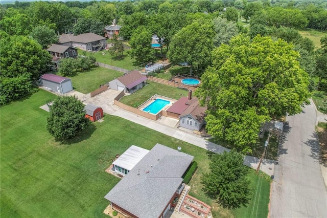 2508 N Mcbride Ave, Sugar Creek, MO 64050 - drone / aerial view of a pool area and a forest