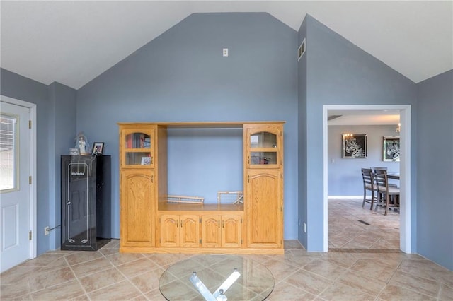 2508 N Mcbride Ave, Sugar Creek, MO 64050 - living area featuring high vaulted ceiling