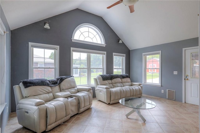 2508 N Mcbride Ave, Sugar Creek, MO 64050 - tiled living area with lofted ceiling and a ceiling fan
