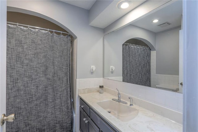 2508 N Mcbride Ave, Sugar Creek, MO 64050 - bathroom featuring vanity and a shower with shower curtain
