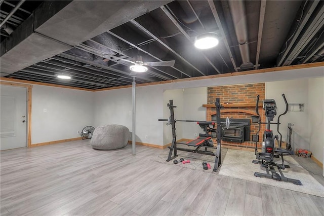 2508 N Mcbride Ave, Sugar Creek, MO 64050 - exercise room featuring baseboards and wood finished floors