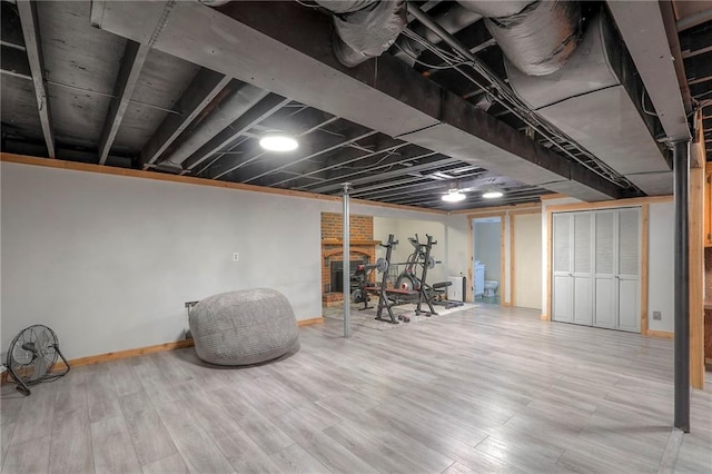 2508 N Mcbride Ave, Sugar Creek, MO 64050 - finished below grade area featuring wood finished floors