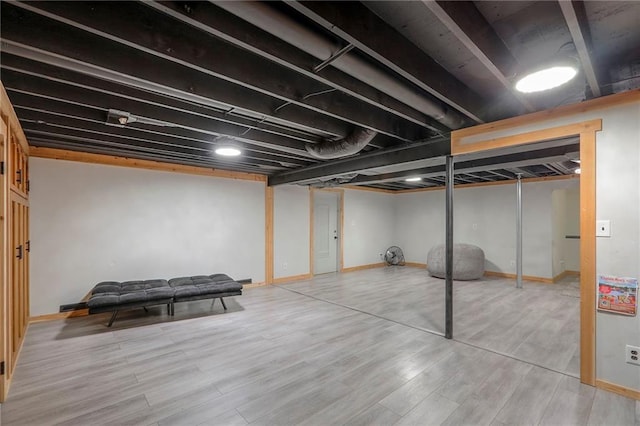 2508 N Mcbride Ave, Sugar Creek, MO 64050 - finished basement featuring wood finished floors