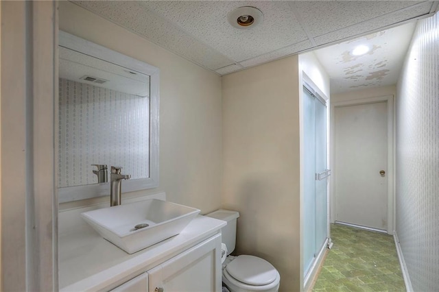 2508 N Mcbride Ave, Sugar Creek, MO 64050 - bathroom with vanity and a drop ceiling