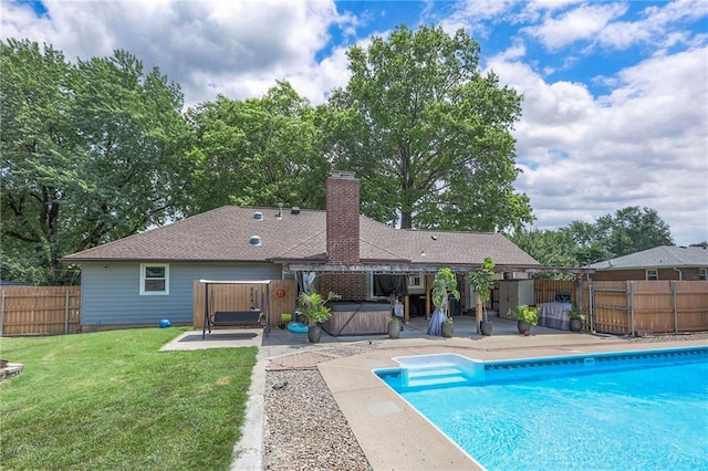 2508 N Mcbride Ave, Sugar Creek, MO 64050 - view of pool with a hot tub, a patio area, and a fenced backyard