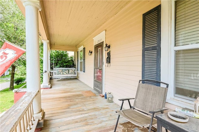 2517 Felix St, Saint Joseph, MO 64501 - view of wooden porch