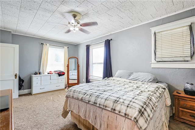 2517 Felix St, Saint Joseph, MO 64501 - carpeted bedroom with ceiling fan and ornamental molding