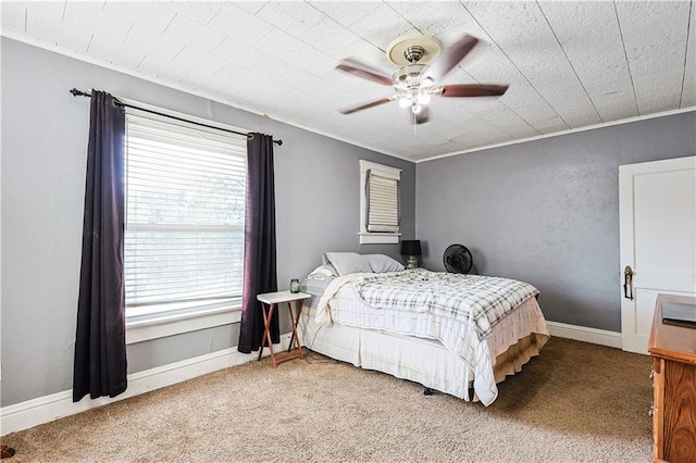 2517 Felix St, Saint Joseph, MO 64501 - carpeted bedroom featuring a ceiling fan and ornamental molding