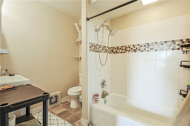 2517 Felix St, Saint Joseph, MO 64501 - bathroom with  shower combination and tile patterned flooring