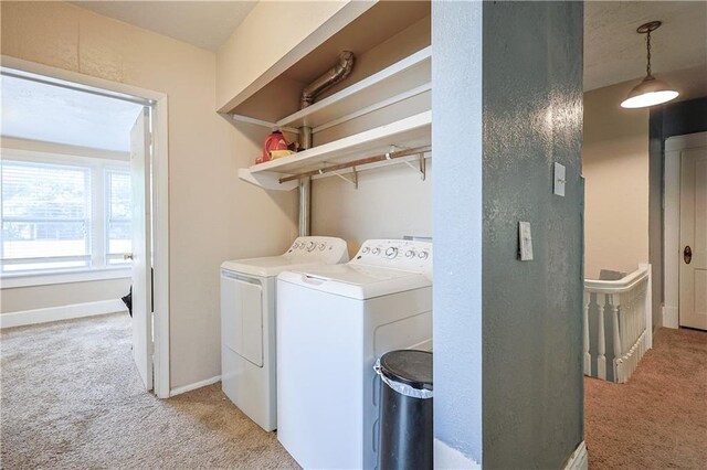 2517 Felix St, Saint Joseph, MO 64501 - washroom with light colored carpet and separate washer and dryer