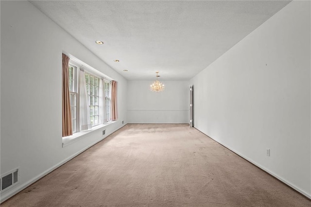 3300 W 93rd St, Leawood, KS 66206 - unfurnished room featuring a chandelier and light colored carpet