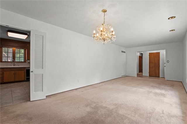 3300 W 93rd St, Leawood, KS 66206 - empty room featuring a chandelier and light carpet