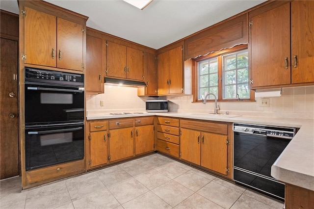 3300 W 93rd St, Leawood, KS 66206 - kitchen featuring black appliances, decorative backsplash, light countertops, and brown cabinets