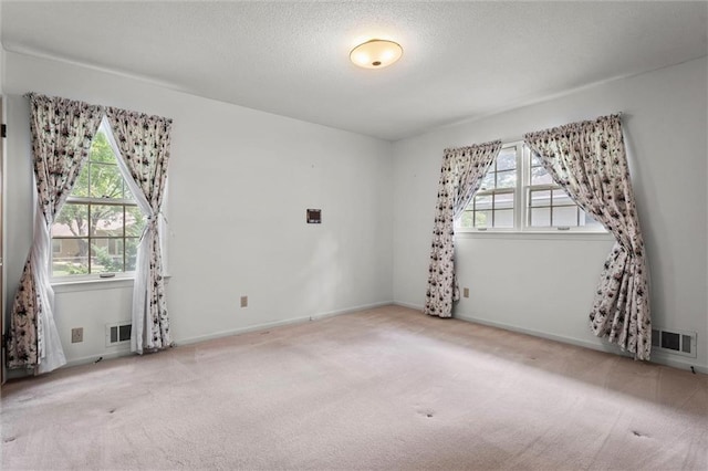 3300 W 93rd St, Leawood, KS 66206 - carpeted empty room featuring a textured ceiling and baseboards