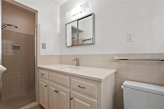3300 W 93rd St, Leawood, KS 66206 - full bathroom with vanity, a stall shower, tile walls, and wainscoting