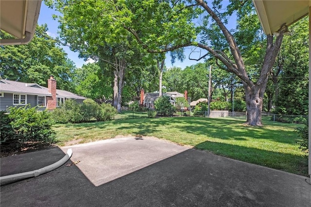 3300 W 93rd St, Leawood, KS 66206 - view of yard with a patio area and view of wooded area