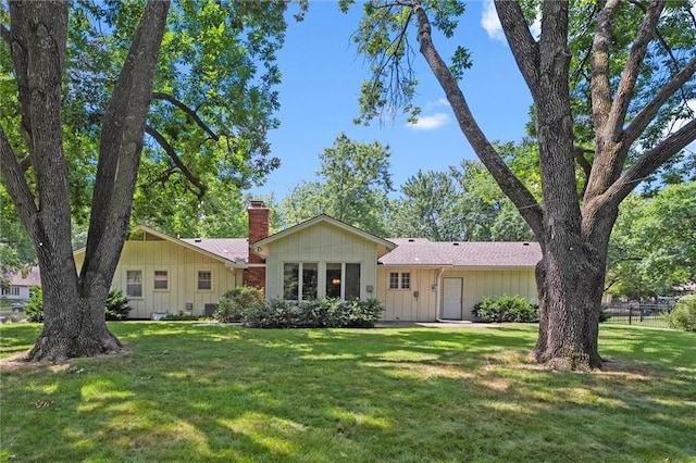3300 W 93rd St, Leawood, KS 66206 - ranch-style home featuring a chimney and board and batten siding