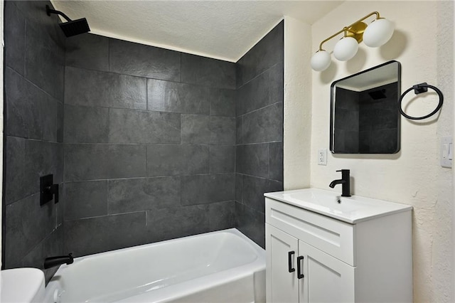 422 N Thompson St, Kansas City, KS 66101 - full bathroom featuring vanity, washtub / shower combination, and a textured ceiling