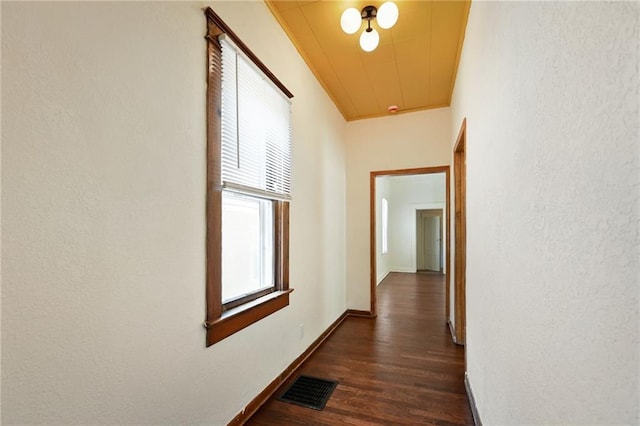 422 N Thompson St, Kansas City, KS 66101 - hall featuring a textured wall and dark wood-style flooring