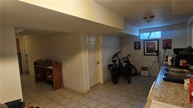 2003 S Elm St, Pittsburg, KS 66762 - exercise area featuring light tile patterned flooring and a sink