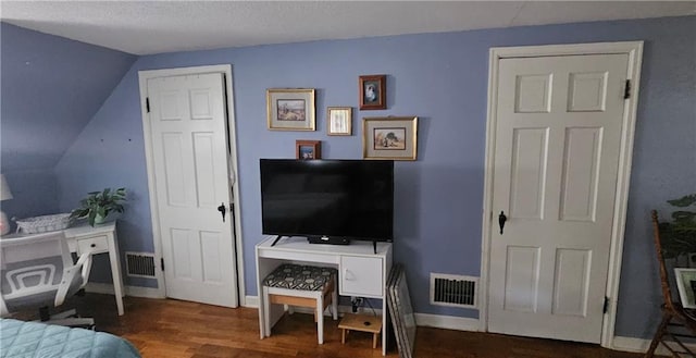 2003 S Elm St, Pittsburg, KS 66762 - bedroom featuring wood finished floors and vaulted ceiling