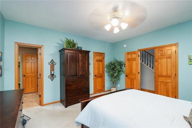 731 E 1100th Rd, Baldwin City, KS 66006 - bedroom with light carpet and a ceiling fan