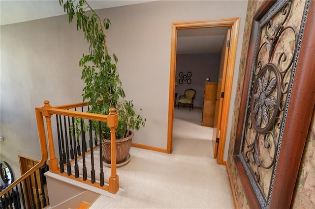731 E 1100th Rd, Baldwin City, KS 66006 - hall featuring carpet flooring and an upstairs landing