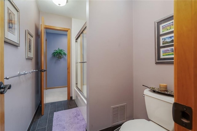 731 E 1100th Rd, Baldwin City, KS 66006 - full bath featuring toilet and tile patterned flooring