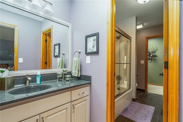 731 E 1100th Rd, Baldwin City, KS 66006 - bathroom featuring vanity, combined bath / shower with glass door, and tile patterned floors