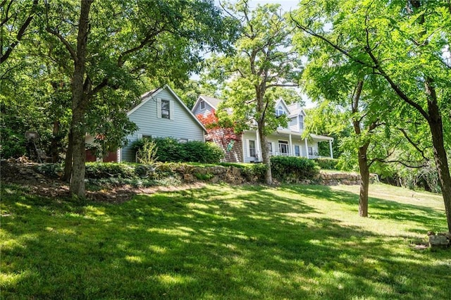 731 E 1100th Rd, Baldwin City, KS 66006 - view of front of house with a front lawn