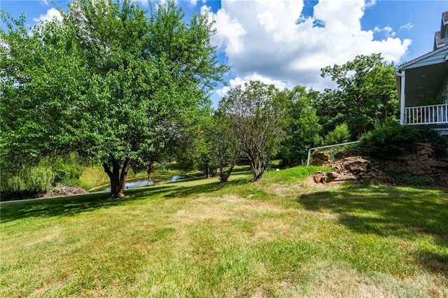 731 E 1100th Rd, Baldwin City, KS 66006 - view of green lawn with a water view