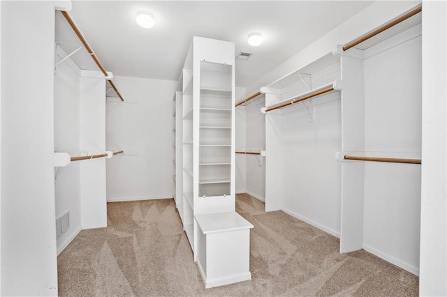 5701 W 146th St, Overland Park, KS 66223 - walk in closet featuring carpet flooring