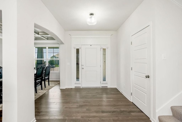 24322 W 58th Cir, Shawnee, KS 66226 - foyer with arched walkways and dark wood-type flooring