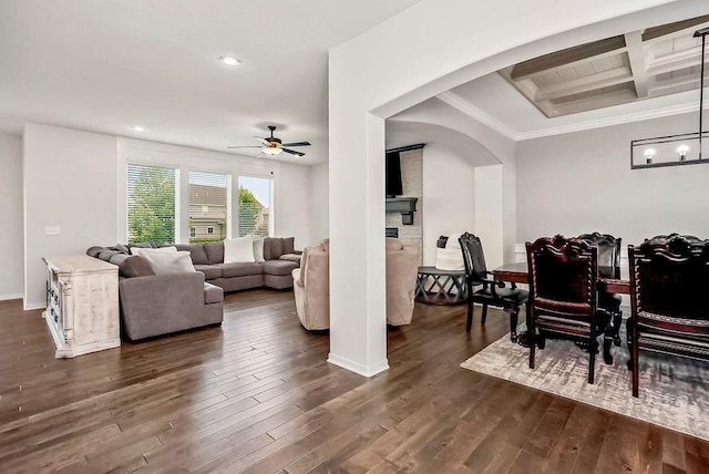 24322 W 58th Cir, Shawnee, KS 66226 - living area featuring a ceiling fan, beam ceiling, dark wood-style floors, recessed lighting, and arched walkways