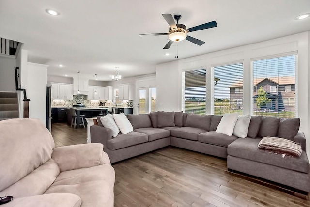 24322 W 58th Cir, Shawnee, KS 66226 - living room with ceiling fan, wood finished floors, recessed lighting, and stairs