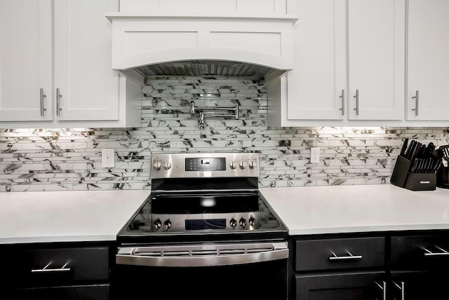 24322 W 58th Cir, Shawnee, KS 66226 - kitchen with electric stove, light countertops, and white cabinets