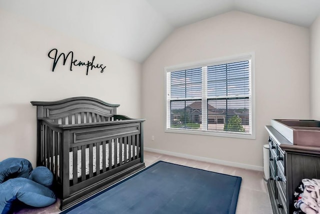 24322 W 58th Cir, Shawnee, KS 66226 - bedroom with lofted ceiling, a nursery area, and light colored carpet