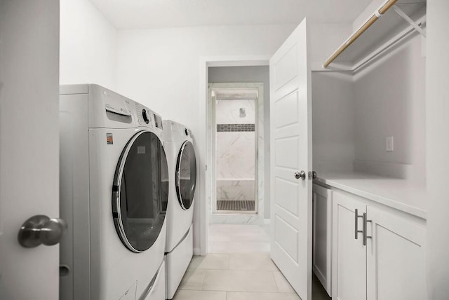 24322 W 58th Cir, Shawnee, KS 66226 - laundry area with washer and clothes dryer and light tile patterned floors