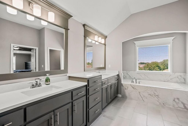 24322 W 58th Cir, Shawnee, KS 66226 - full bathroom featuring vanity, lofted ceiling, a bath, and tile patterned floors