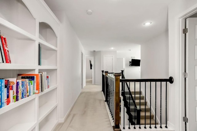 24322 W 58th Cir, Shawnee, KS 66226 - hallway with an upstairs landing, recessed lighting, and light carpet