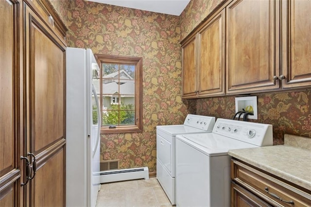 8320 Maplewood Ln, Lenexa, KS 66215 - laundry room featuring cabinet space, wallpapered walls, a baseboard heating unit, and washer and dryer