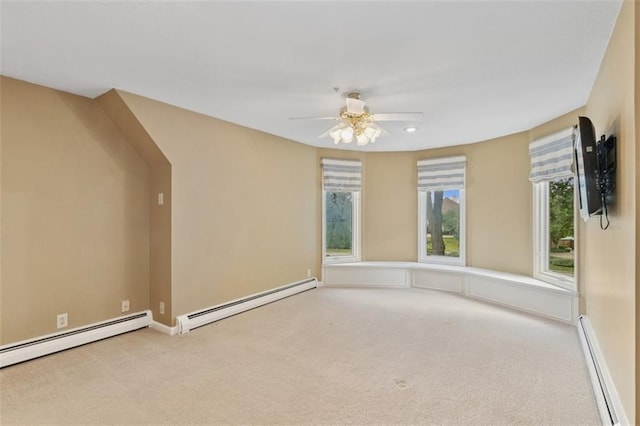 8320 Maplewood Ln, Lenexa, KS 66215 - empty room with a baseboard radiator, carpet floors, and recessed lighting