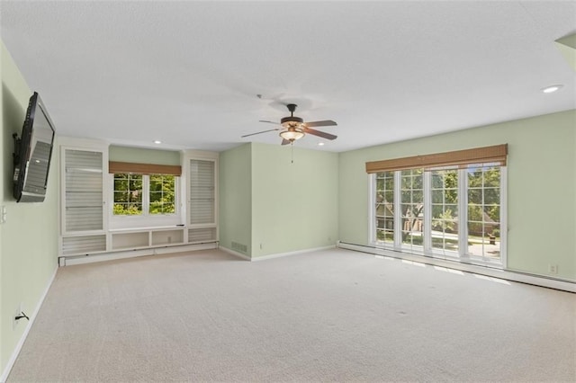 8320 Maplewood Ln, Lenexa, KS 66215 - carpeted empty room with ceiling fan, healthy amount of natural light, and recessed lighting