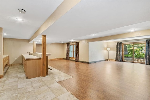 8320 Maplewood Ln, Lenexa, KS 66215 - indoor wet bar featuring light wood-type flooring and recessed lighting