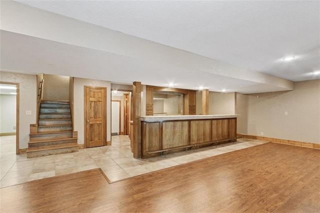 8320 Maplewood Ln, Lenexa, KS 66215 - indoor bar with light wood-style flooring, stairway, and recessed lighting