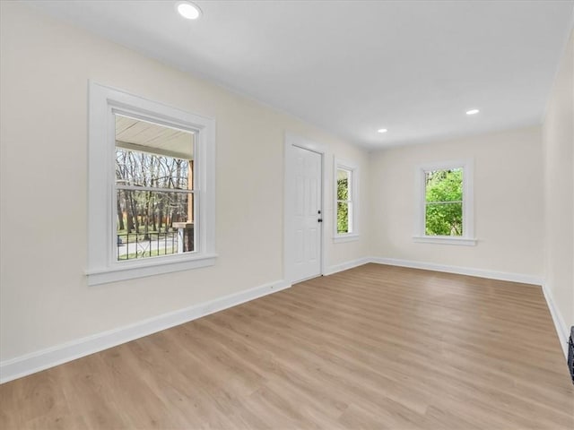 3928 E 58th St, Kansas City, MO 64132 - foyer entrance with light wood-type flooring and recessed lighting