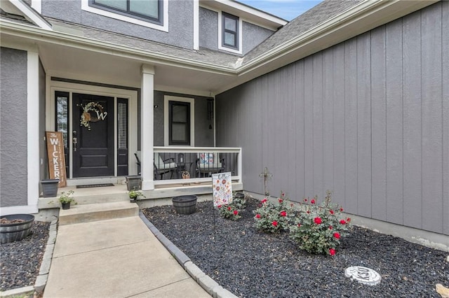 23968 Eagle Ct, Paola, KS 66071 - entrance to property featuring a porch and roof with shingles