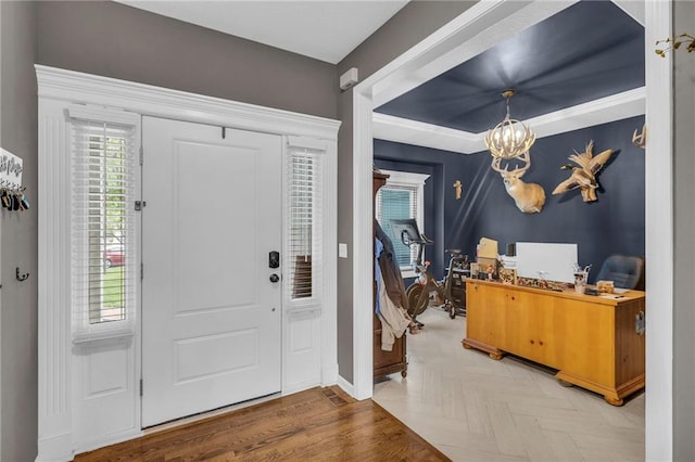23968 Eagle Ct, Paola, KS 66071 - foyer with a chandelier and baseboards