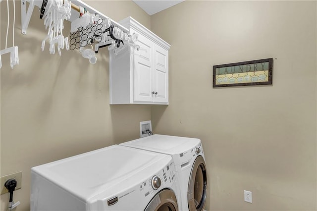23968 Eagle Ct, Paola, KS 66071 - laundry area featuring washing machine and clothes dryer and cabinet space