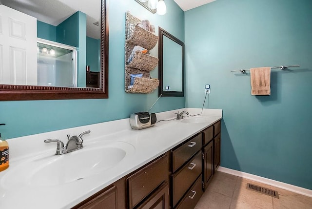 1229 Starbrooke Dr, Louisburg, KS 66053 - full bathroom with double vanity and tile patterned floors